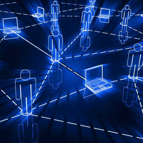 A digital illustration of a network concept with glowing blue outlines of human figures and laptops connected by dashed lines. The image represents connectivity and communication within a virtual or technological environment.